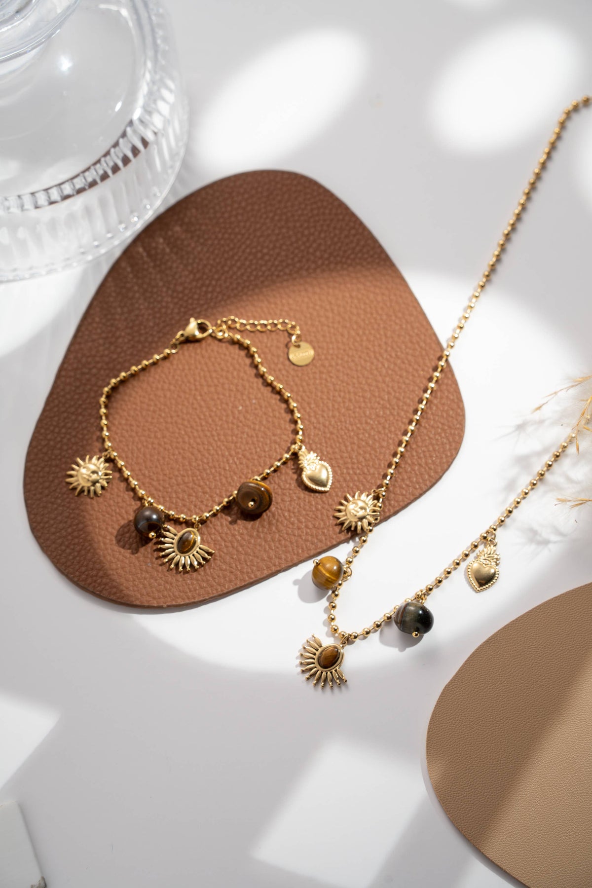 Parure collier bracelet soleil cœur pierres œil tigre doré